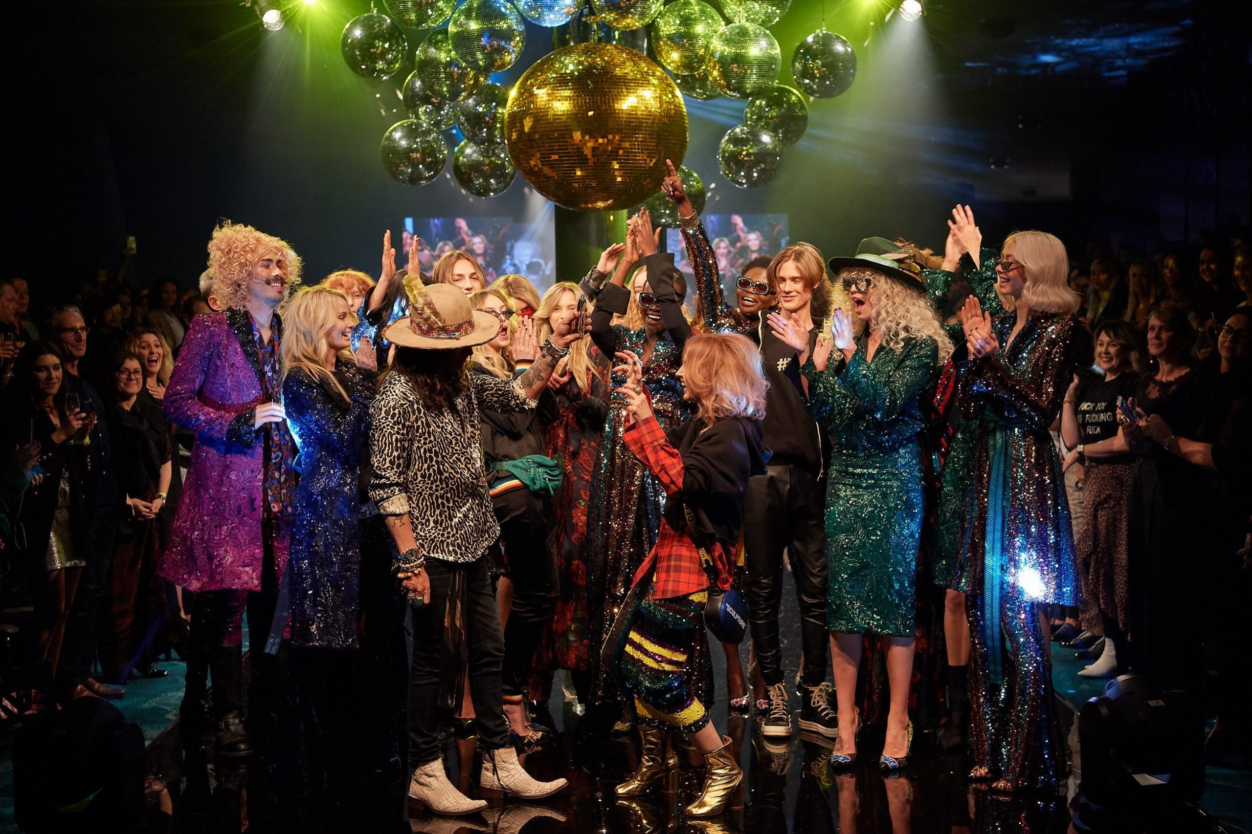 Designer Catherine Cezeika takes a bow with the cast at her Empire Rose - Rock Star Runway at TPFF